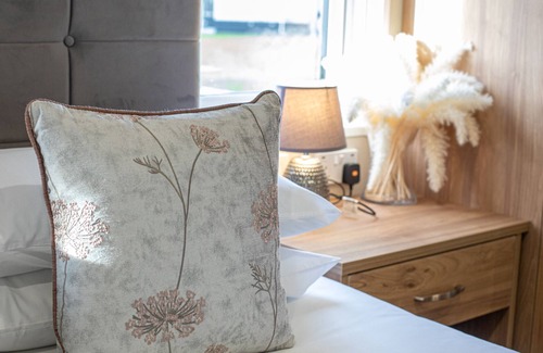 St. Andrews Cottage | Stewart Resort Lodge 50 - a lodge that sleeps 6 guests in 3 bedrooms