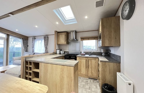 St. Andrews Cottage | Stewarts Resort Lodge 23 - a lodge that sleeps 6 guests in 3 bedrooms