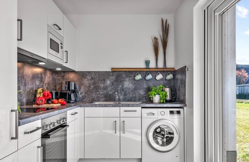 Busum Apartment | Stilvolle Ferienwohnung mit Sauna, Kamin, Terrasse und Wassernähe
