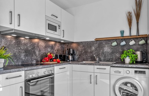 Busum Apartment | Stilvolle Ferienwohnung mit Sauna, Kamin, Terrasse und Wassernähe