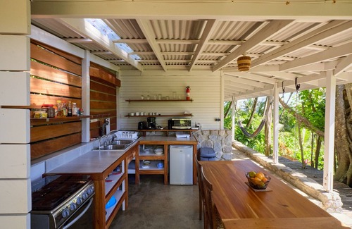 La Plaine House | Stone cottage around a Banyan tree