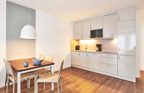 Bensersiel Apartment | Strandnahes, Modernes Apartment mit Westbalkon Inkl. Schwimmbad- & Saunanutzung