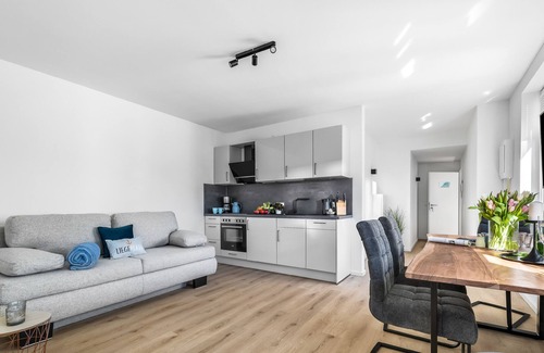 Gelting Apartment | Strandleben - upper floor, bathroom with shower, TV, parking space, terrace, barbecue, garden furniture,