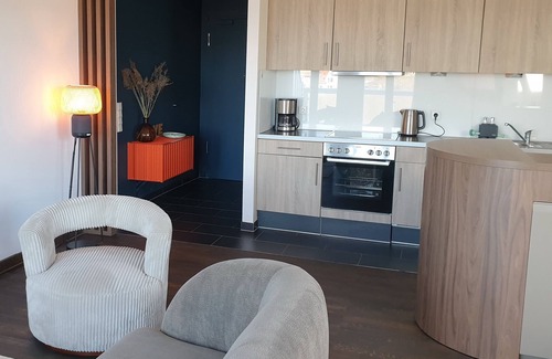Wremen Apartment | Strandnahe, Tolle 92 qm Dachgeschosswohnung mit Sauna, 2 Balkonen und Meerblick