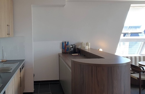 Wremen Apartment | Strandnahe, Tolle 92 qm Dachgeschosswohnung mit Sauna, 2 Balkonen und Meerblick