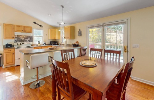 Frank House | Streamside cottage on +2 acres with large deck, firepit, fireplace, & W/D