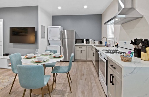 Walnut Valley House | Studio Haven Perfect for Small Families or Solo Travelers with a King Bed, Epic Kitchen, In-Unit Laundry, and Convenient Front Parking.