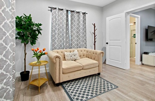 Walnut Valley House | Studio Haven Perfect for Small Families or Solo Travelers with a King Bed, Epic Kitchen, In-Unit Laundry, and Convenient Front Parking.