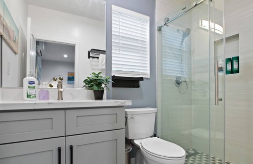 Walnut Valley House | Studio Haven Perfect for Small Families or Solo Travelers with a King Bed, Epic Kitchen, In-Unit Laundry, and Convenient Front Parking.