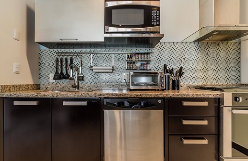 Downtown Condo | Stunning 3 bedroom Penthouse. Private rooftop and pool. Steps to 5th and Beach