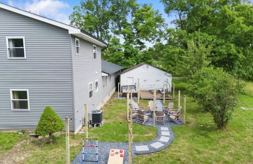 East Stroudsburg House | Stunning 4BR, 4BA Luxury Home with Hot Tub, Game Room & Fire Pit! Sleeps 12
