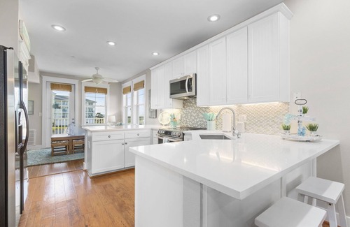 Red Fish Cove Condo | STUNNING BEACHFRONT WITH TRIPLE WATER VIEWS OF OCEAN, LAKE, BAY!
