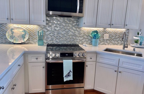 Red Fish Cove Condo | STUNNING BEACHFRONT WITH TRIPLE WATER VIEWS OF OCEAN, LAKE, BAY!