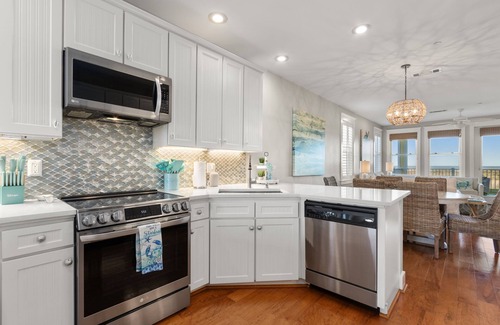 Red Fish Cove Condo | STUNNING BEACHFRONT WITH TRIPLE WATER VIEWS OF OCEAN, LAKE, BAY!