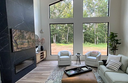 Dewy Rose House | Stunning contemporary home in the woods; sauna, screened porch, soaring ceilings