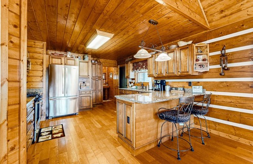 Ellijay Cabin | Stunning creek-view home with private hot tub, game room, firepit