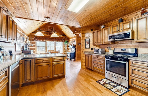 Ellijay Cabin | Stunning creek-view home with private hot tub, game room, firepit