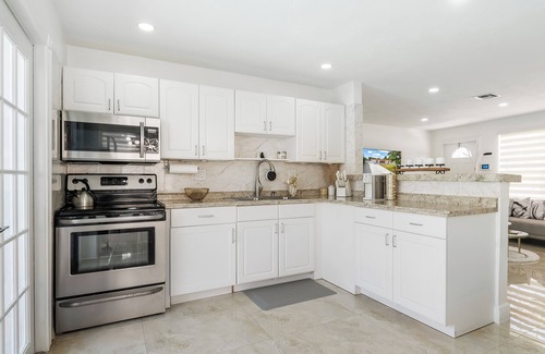 Pompano Beach House | Stunning Home with a HEATED POOL 4 miles to the beach!