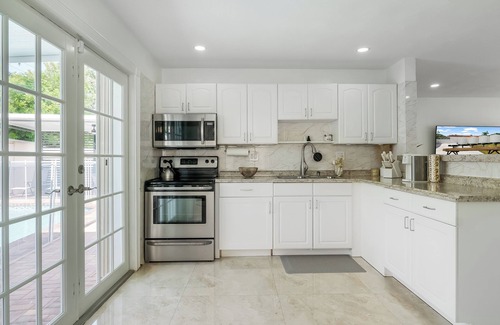 Pompano Beach House | Stunning Home with a HEATED POOL 4 miles to the beach!