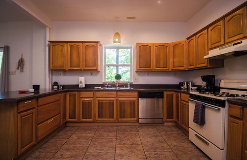 Oconee County Apartment | Stunning Lakeside Garden Level Home with Large Dock, Pet-Friendly!