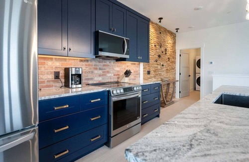 Grand Haven Condo | Stunning Luxury Condo in Downtown Grand Haven!