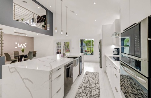 Rural Estates House | Stunning Naples home on 2 acres surrounded by beautiful palm trees and pool!