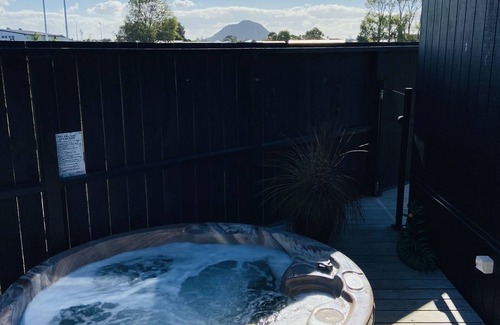 Omanu House | Stunning NEW property close to beach, views to Mount, spa and all the mod cons.