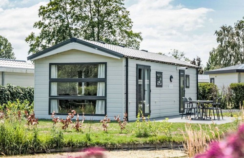 Dordtse Biesbosch House | Stunning private villa for 4 people with pool, WIFI, TV, terrace and parking