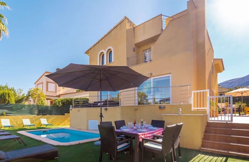 Urbanizacion Mont Ferrutx Villa | Stunning private villa for 8 people with WIFI, A/C, hot tub, private pool, TV, patio and parking