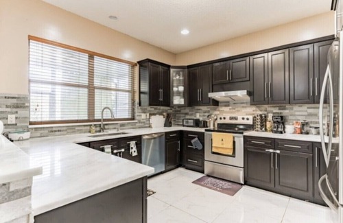 Survey Creek House | Stunning Spacious and Modern Water Front Home in a Super Desirable Neighborhood!