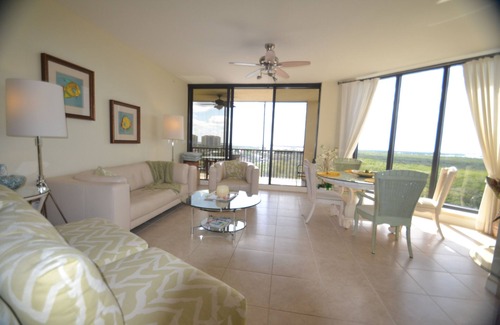 Cape Harbour Condo | Stunning Sunset Views * Steps away from fine dining, marina, live music, & more.