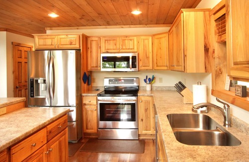 Eagle River House | Stunning views and fun at brand new home on Eagle River Chain Catfish Lake.