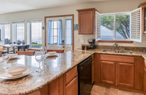 Beverly Beach House | Stunning views and sunsets from this pet friendly oceanfront home with a hot tub