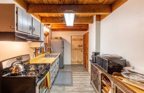 Whittier Cabin | Stunning water-view cabin with fireplace, sunroom, deck, firepit, & fast WiFi