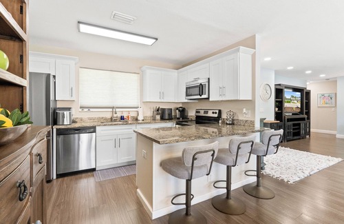 Golfview Harbor House | Stunning Waterfront 3BD/2BA Home w/Heated Pool- 1 Mile from Beach!