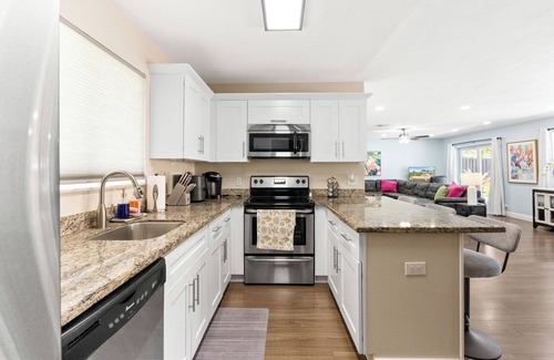 Golfview Harbor House | Stunning Waterfront 3BD/2BA Home w/Heated Pool- 1 Mile from Beach!
