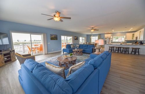 Long Neck House | Stunning-waterfront, beach, pools, family fun & pets!