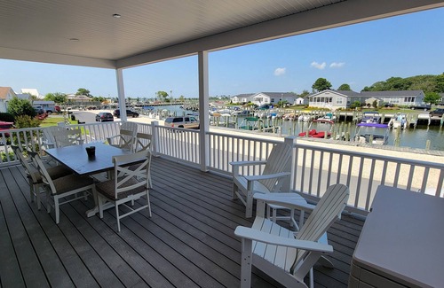 Long Neck House | Stunning waterfront home, beach, pools, pet friendly!