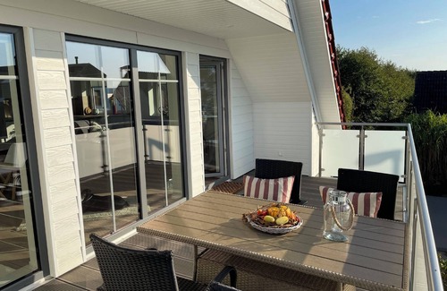 Gelting Apartment | Stuuv dree - 1st floor, sauna, wood-burning stove, balcony, garden furniture, barbecue, electric charging station