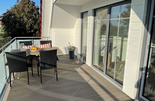 Gelting Apartment | Stuuv dree - 1st floor, sauna, wood-burning stove, balcony, garden furniture, barbecue, electric charging station