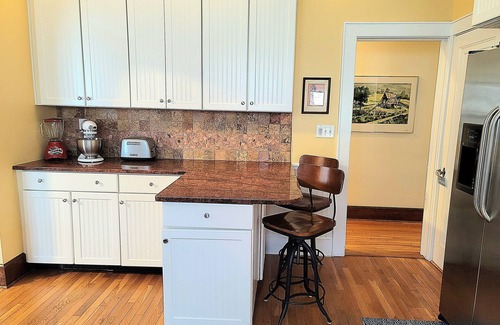 New London House | Stylish 1920s Craftsman Bungalow; tastefully appointed.