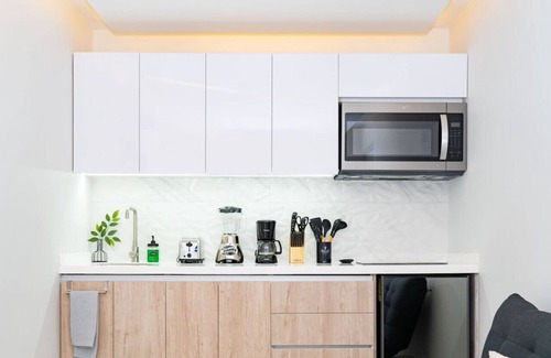 Luis Donaldo Colosio Apartment | Stylish 1BR | Private Balcony + Rooftop with Sea View