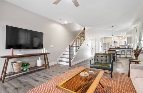Near Northside Apartment | Stylish 3-Story Home Sleeps 14 Near Monon Trl WiFi, AC + Private Hot Tub