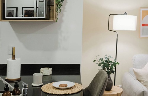 Cuauhtemoc Apartment | Stylish and cozy loft just one block from Roma Norte. Enjoy a comfy bed, smart TV, full kitchen, and fast Wi-Fi. The building features a rooftop pool with stunning views, gym, co-working area, and kids’ playroom.