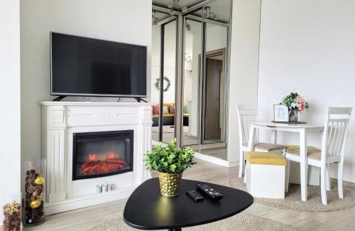Bucharest Apartment | Stylish City Escape, Fireplace, Sunset Views