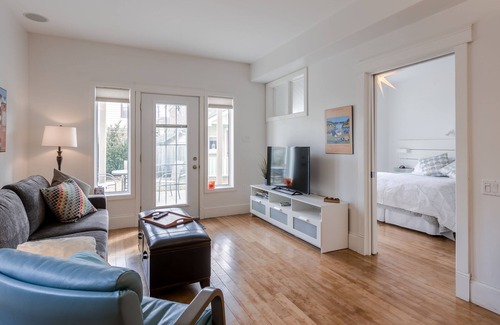 North End House | Stylish, dog friendly 2 bdrm main floor in duplex w fenced yard, onsite parking
