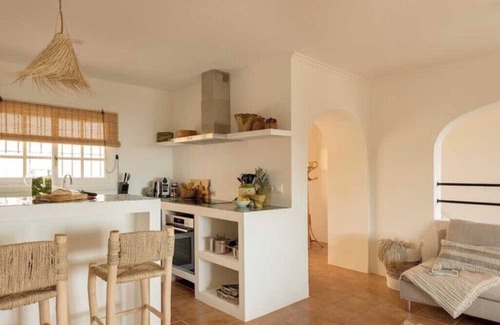 Benimeit Villa | Stylish Duplex in Moraira with Stunning Sea Views and Communal Pool.