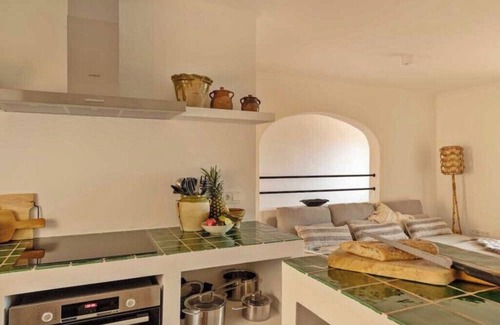 Benimeit Villa | Stylish Duplex in Moraira with Stunning Sea Views and Communal Pool.