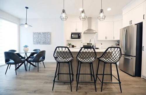 Southwest Edmonton House | Stylish Home with AC, 3 King Beds, Garage, Disney