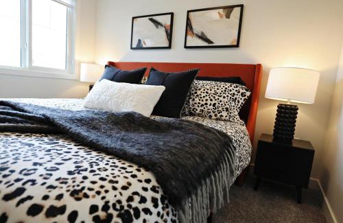 Southwest Edmonton House | Stylish Home with AC, 3 King Beds, Garage, Disney
